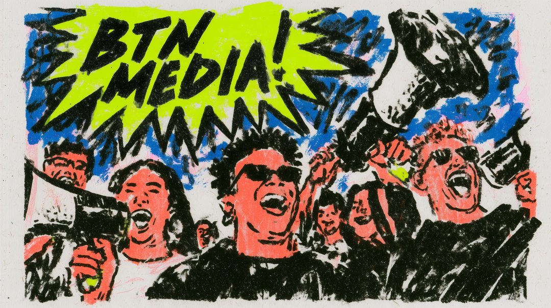 A crowd shouting BTN Media through megaphones