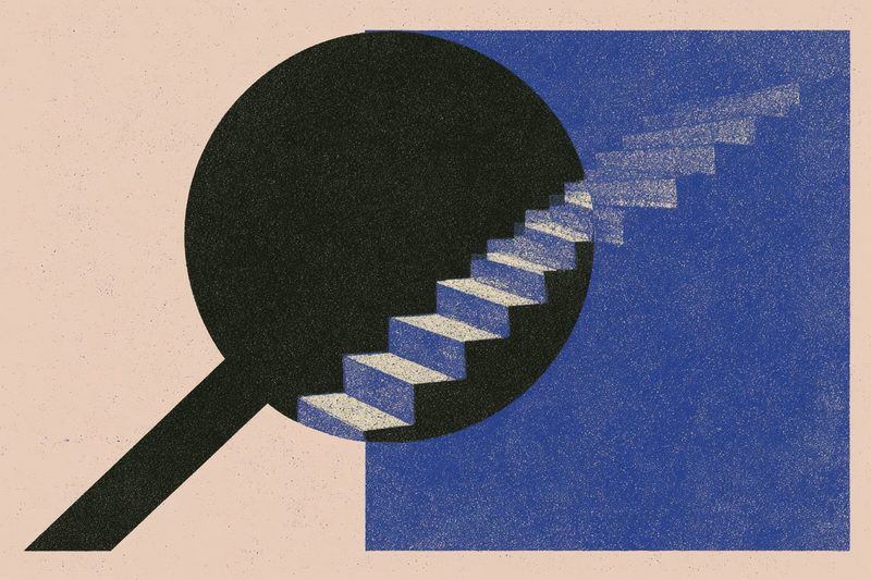 A magnifying glass revealing a staircase